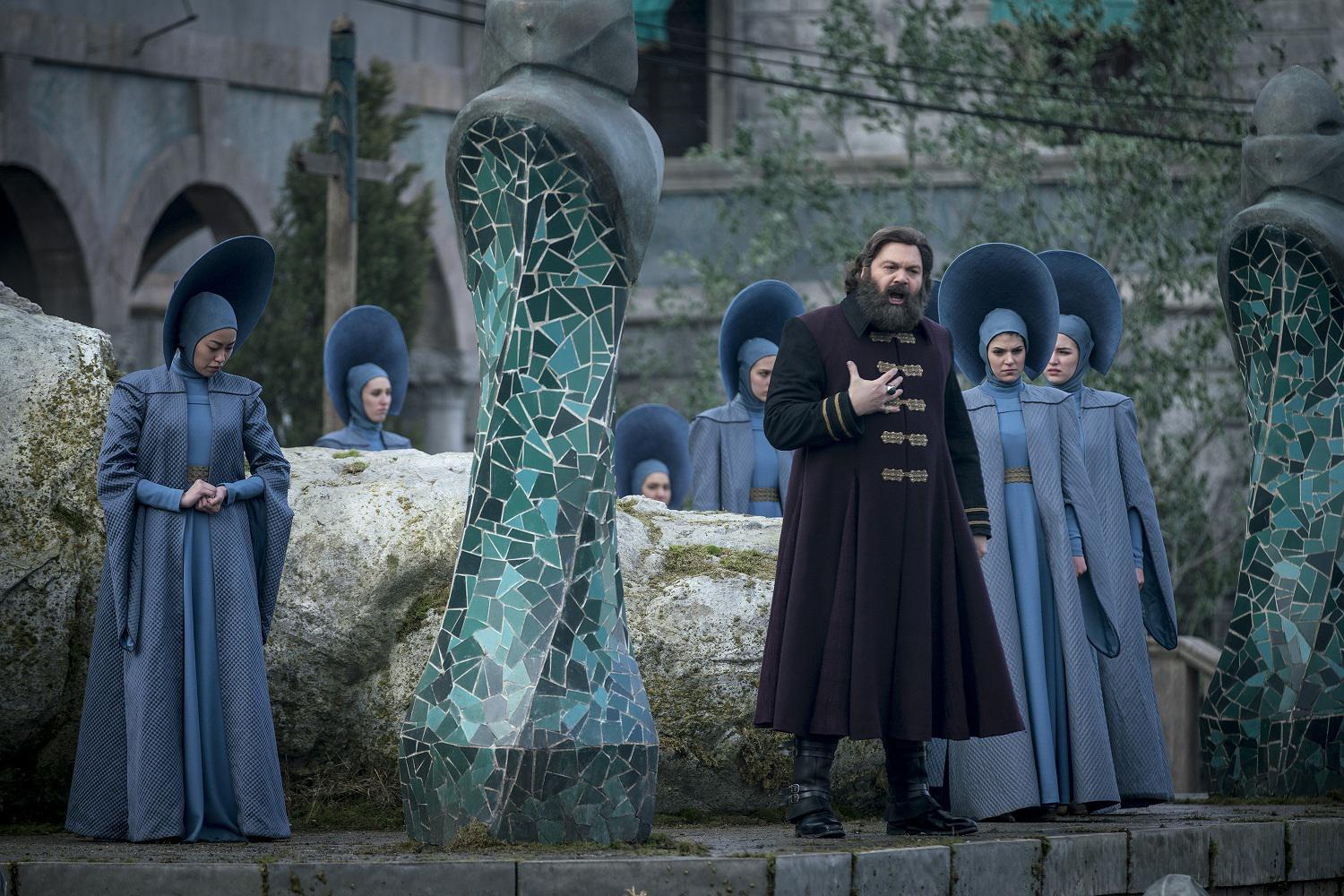 EMERALD CITY -- "The Beast Forever" Episode 101-- Pictured: (l-r) Susan-Li Ong as Isabel, Vincent D'onofrio as The Wizard -- (Photo by: David Lukacs/NBC)