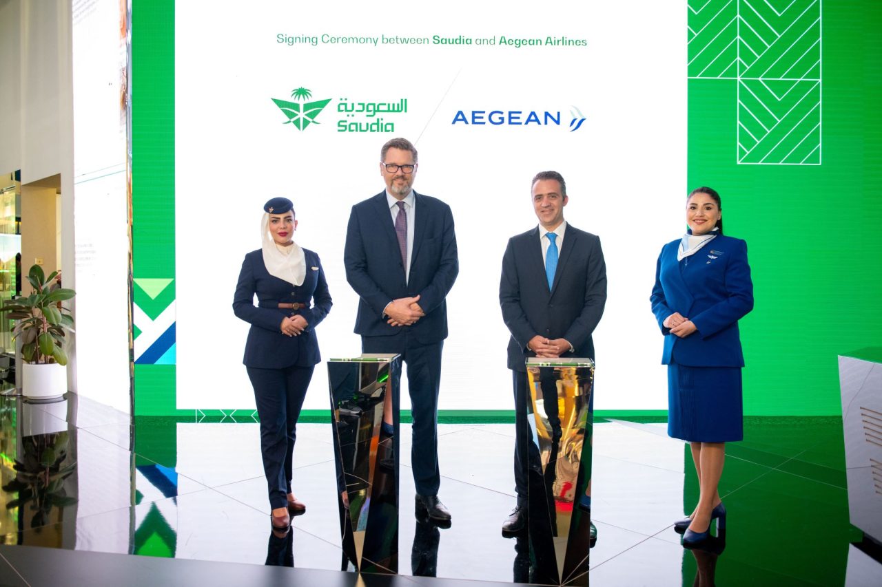 Arved Von Zur Muehlen Chief Commercial Officer Saudia and Yannis Rasoglou Network Planning and Airline Partnerships Director AEGEAN with Cabin Crew Members
