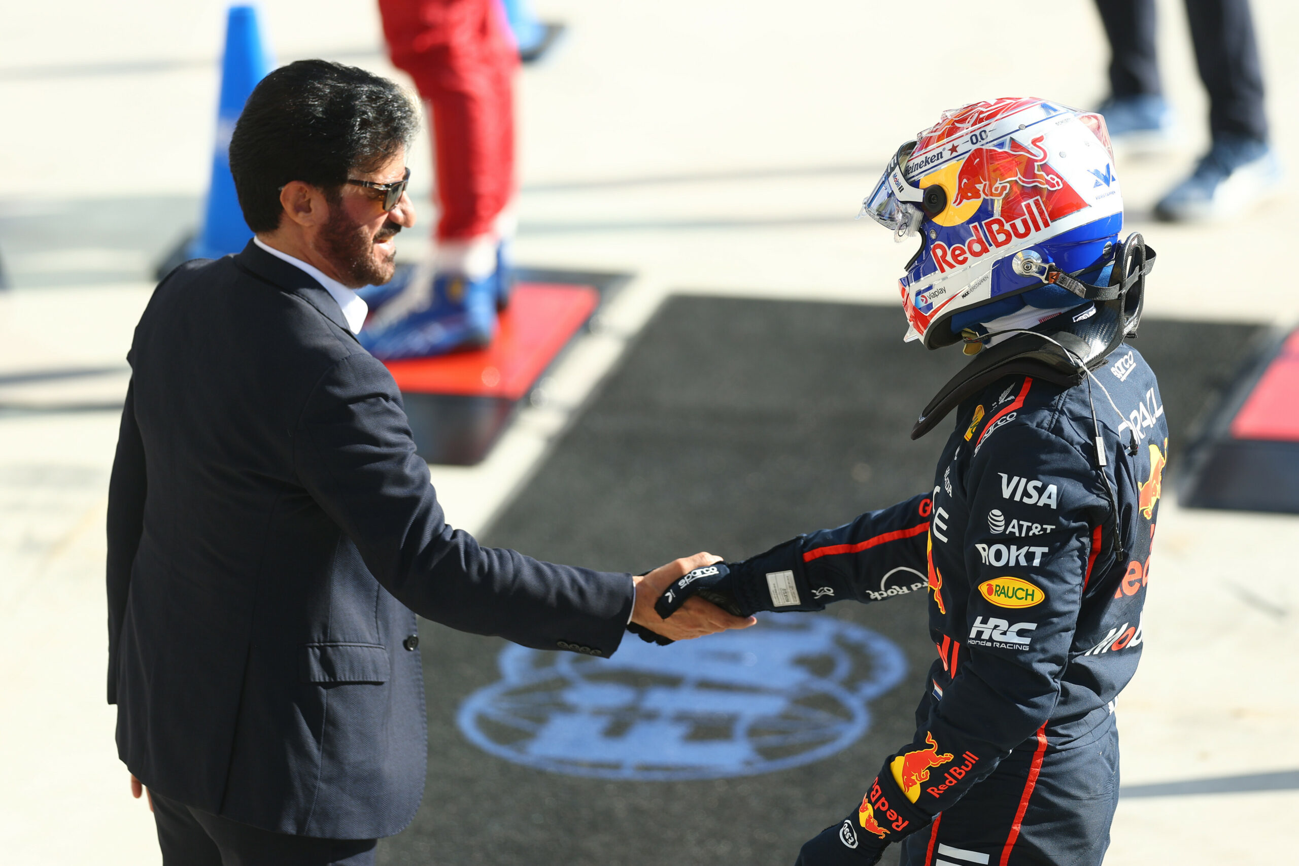 MONZA, ITALY - SEPTEMBER 06: Pole position qualifier Max Verstappen of the Netherlands and Oracle Red Bull Racing is congratulated by Mohammed ben Sulayem, FIA President in parc ferme during qualifying ahead of the F1 Grand Prix of Italy at Autodromo Nazionale Monza on September 06, 2025 in Monza, Italy. (Photo by Zak Mauger/LAT Images) // Getty Images / Red Bull Content Pool // SI202509060518 // Usage for editorial use only //